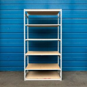 White E-Z Rect trimline bay shelving unit against blue wall.