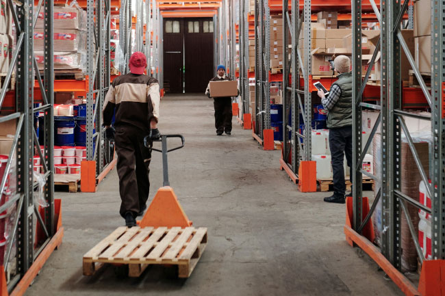 Warehouse workers going about their day